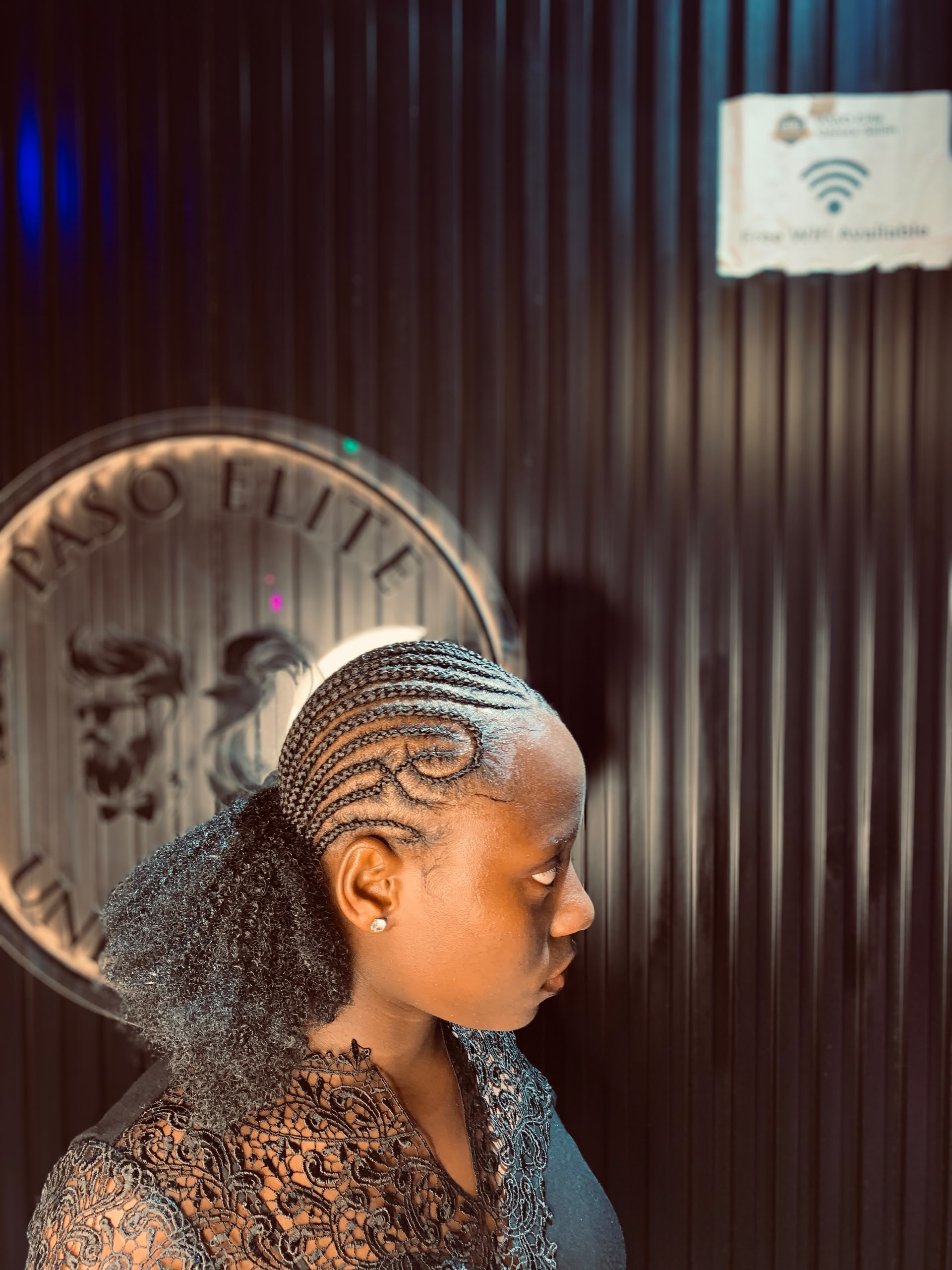 Curved Cornrow Swirl & Afro Bun